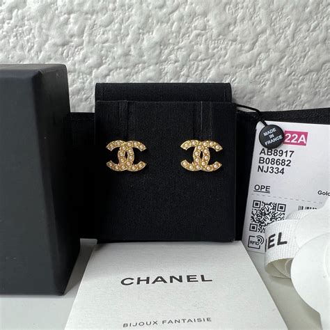 fake chanel cc logo stud earrings|chanel vintage logo earrings.